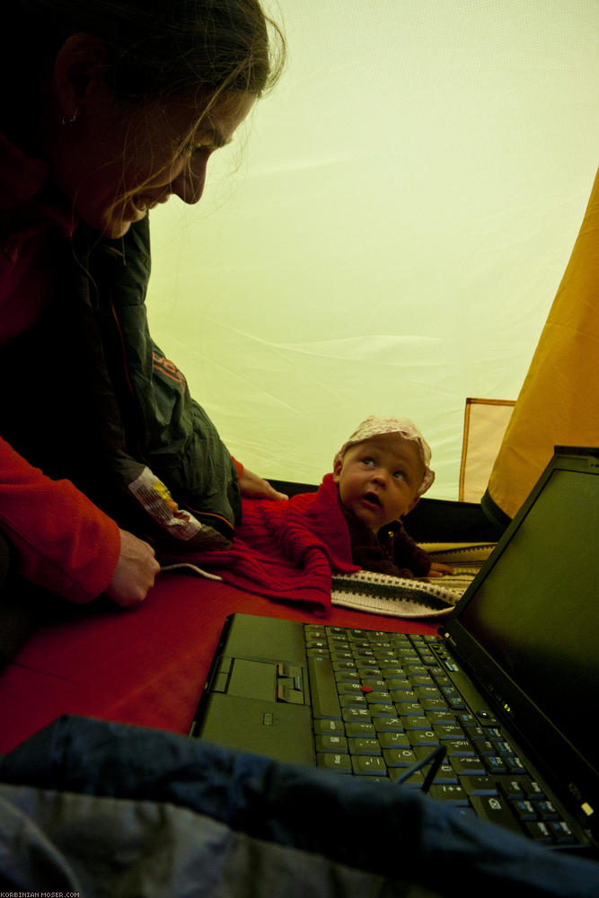 ﻿Comfortable. Our large tent protects us from the rain.