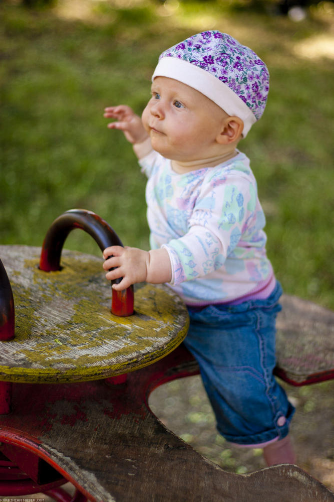 ﻿Wow. Mona can sit on the rocker all alone already. Even one-handed.