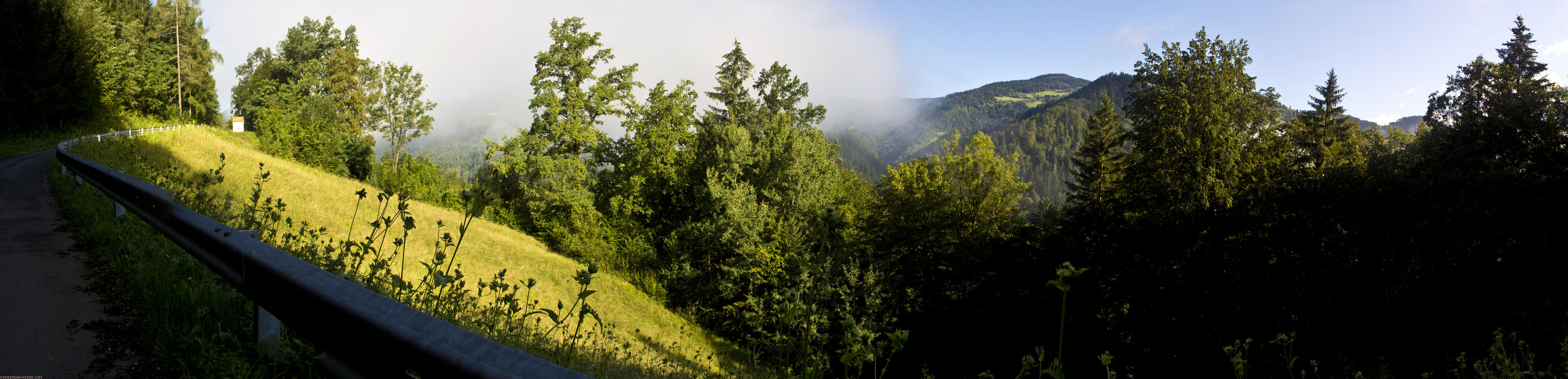 ﻿Wonderful sunrise with low clowds in the mountains.