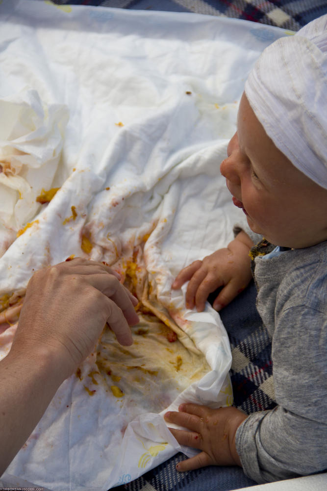 ﻿Triumph. She had been able to eat up the complete peach. Her laughing is full of pride.