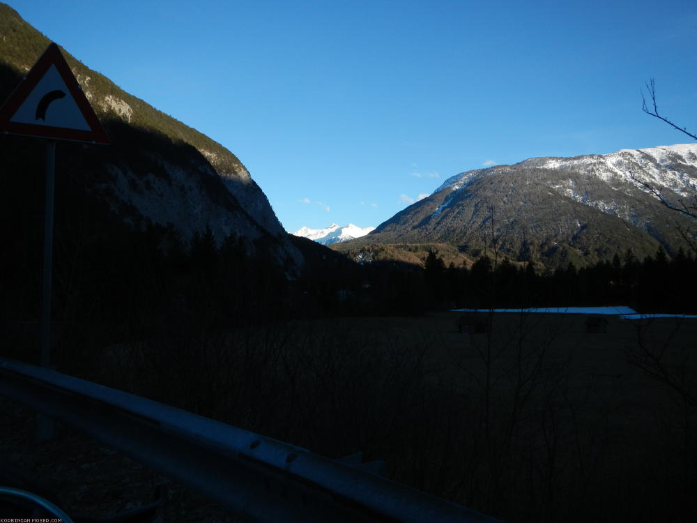 ﻿Nearly night here. Bright golden evening sun on the mountains over there.