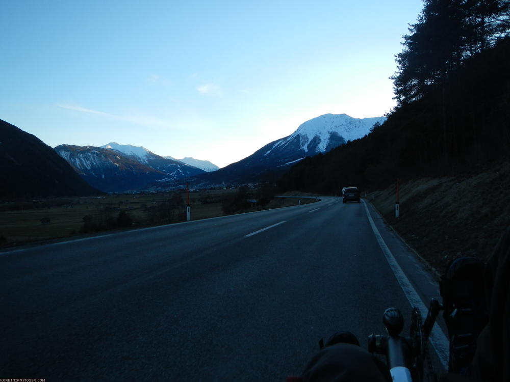 ﻿Nearly night here. Bright golden evening sun on the mountains over there.